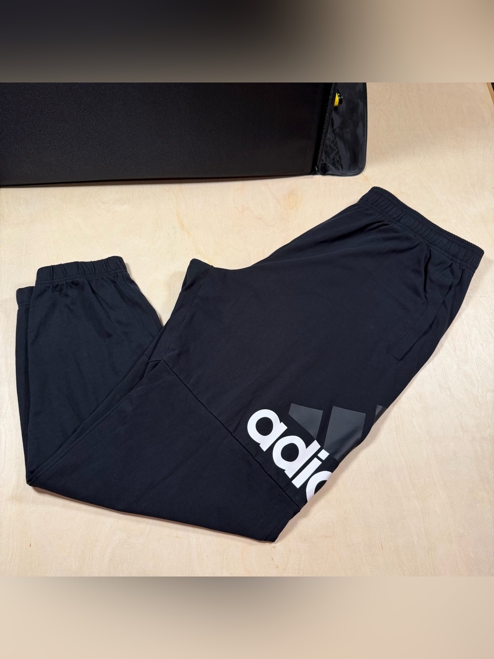 Men’s Adidas Essentials Black Track Pants W/White Logo On Front Left Leg Size XL
